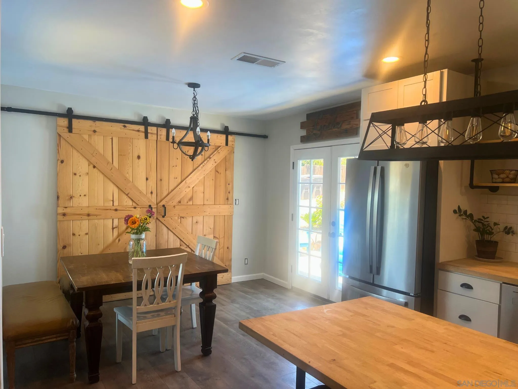 80 Willowside Terrace Alpine, CA 91901 - Photo 11 of 41 a room with a table chairs and entryway