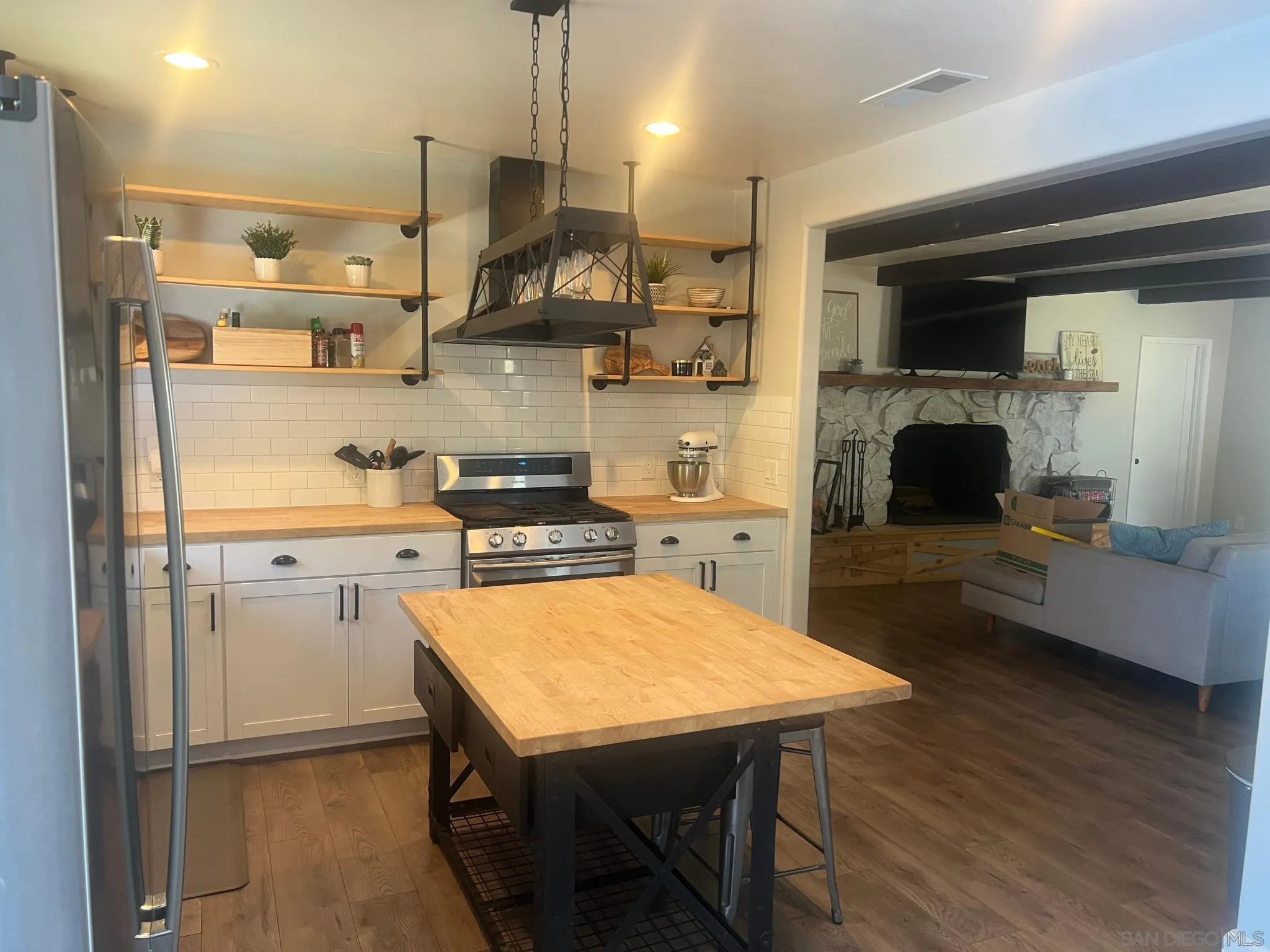 80 Willowside Terrace Alpine, CA 91901 - Photo 12 of 41 a kitchen with a sink a stove and a refrigerator