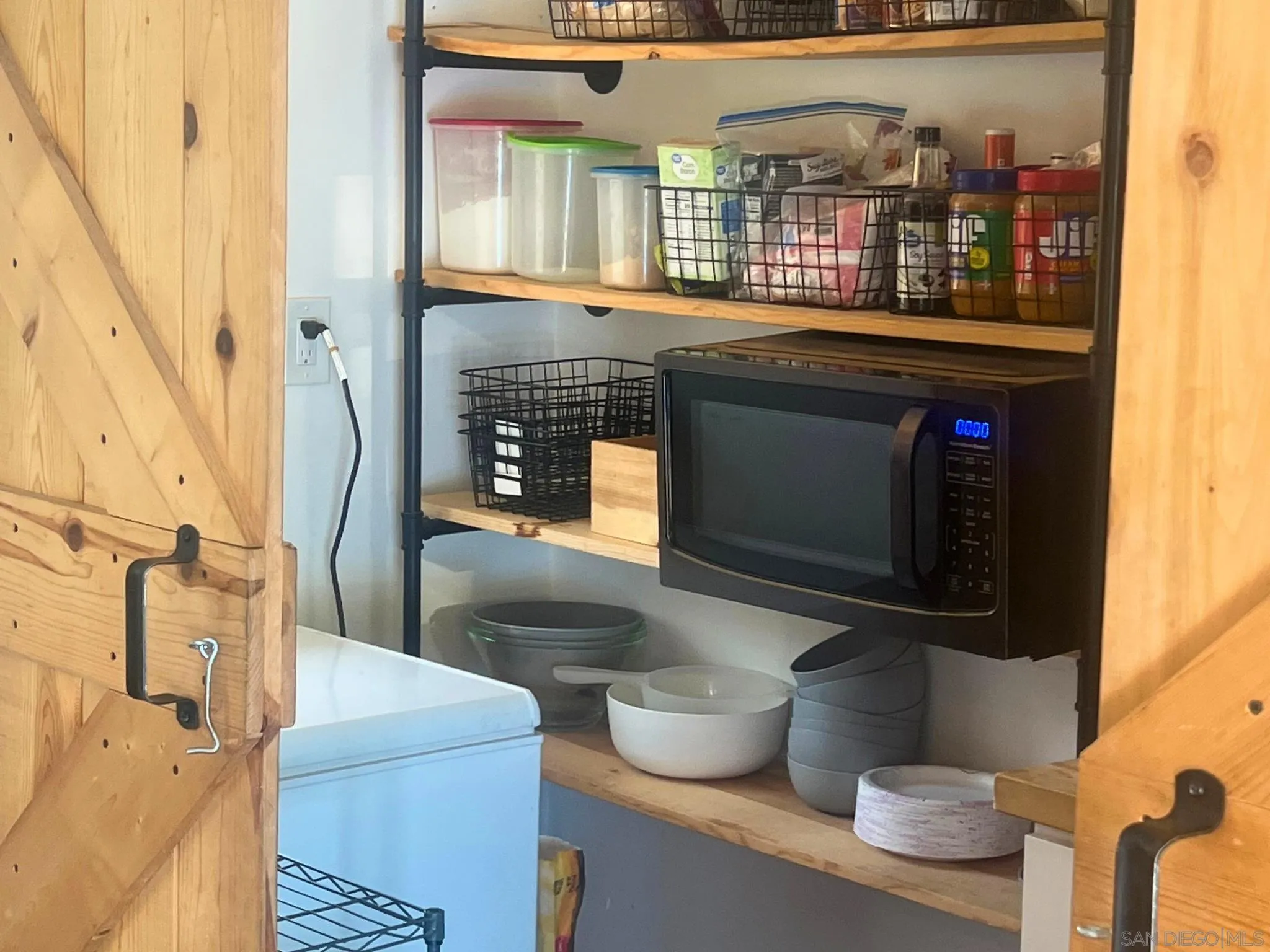 80 Willowside Terrace Alpine, CA 91901 - Photo 13 of 41 a room with a fireplace and wooden floor
