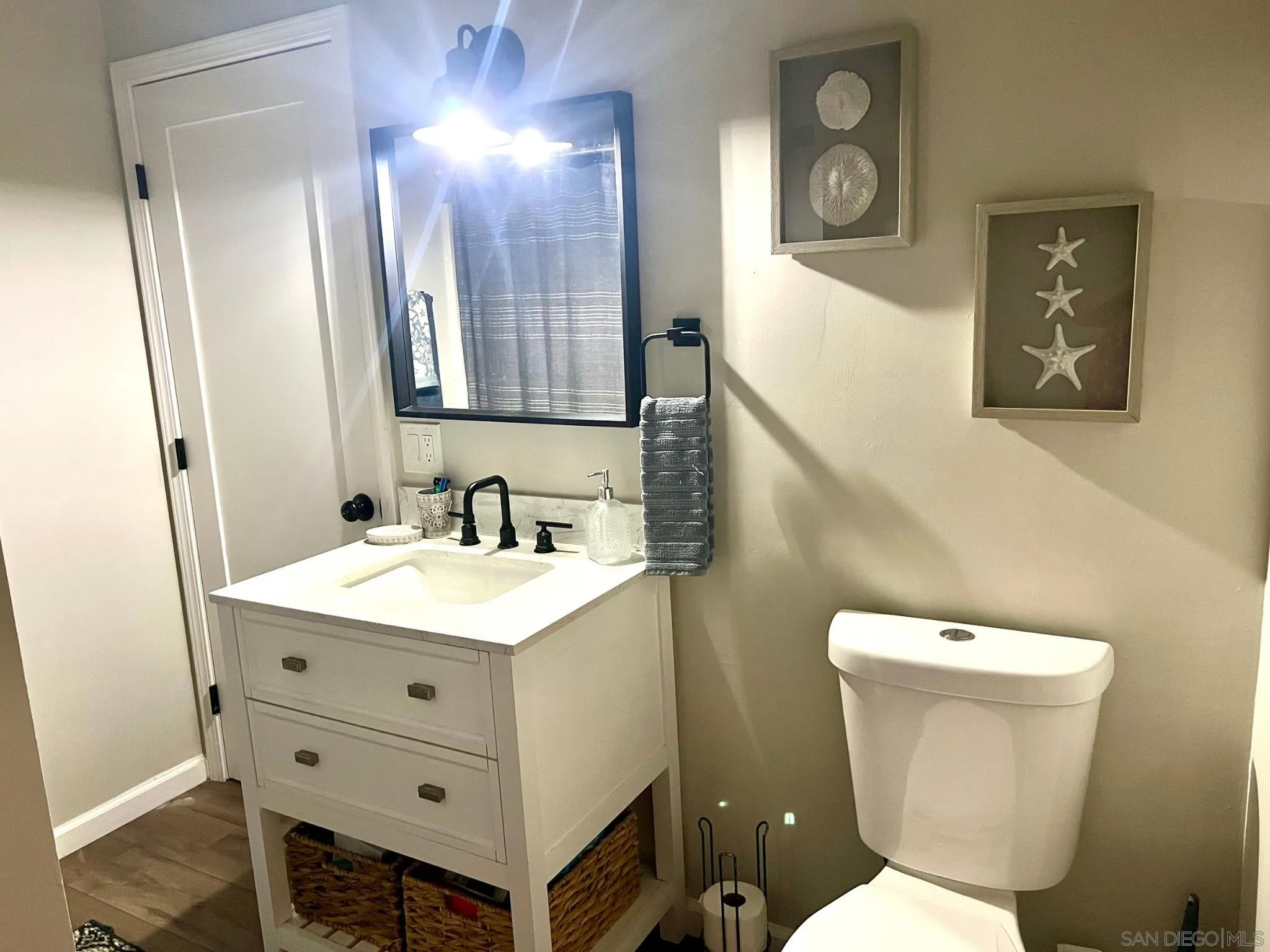 80 Willowside Terrace Alpine, CA 91901 - Photo 24 of 41 a bathroom with a toilet sink and mirror