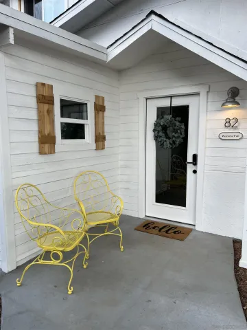 a building outdoor space with patio furniture