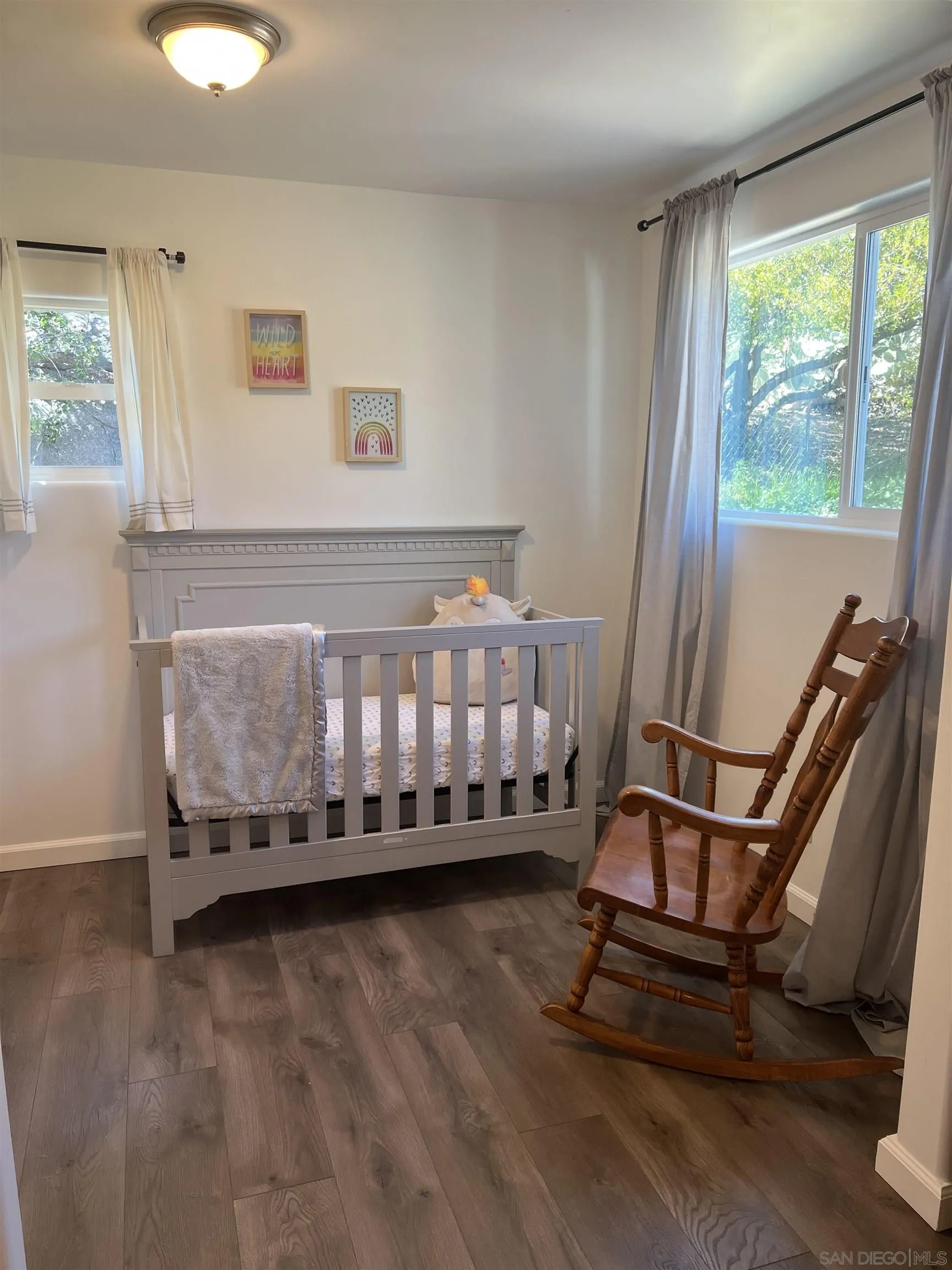 80 Willowside Terrace Alpine, CA 91901 - Photo 35 of 41 a bedroom with a bed chair and window
