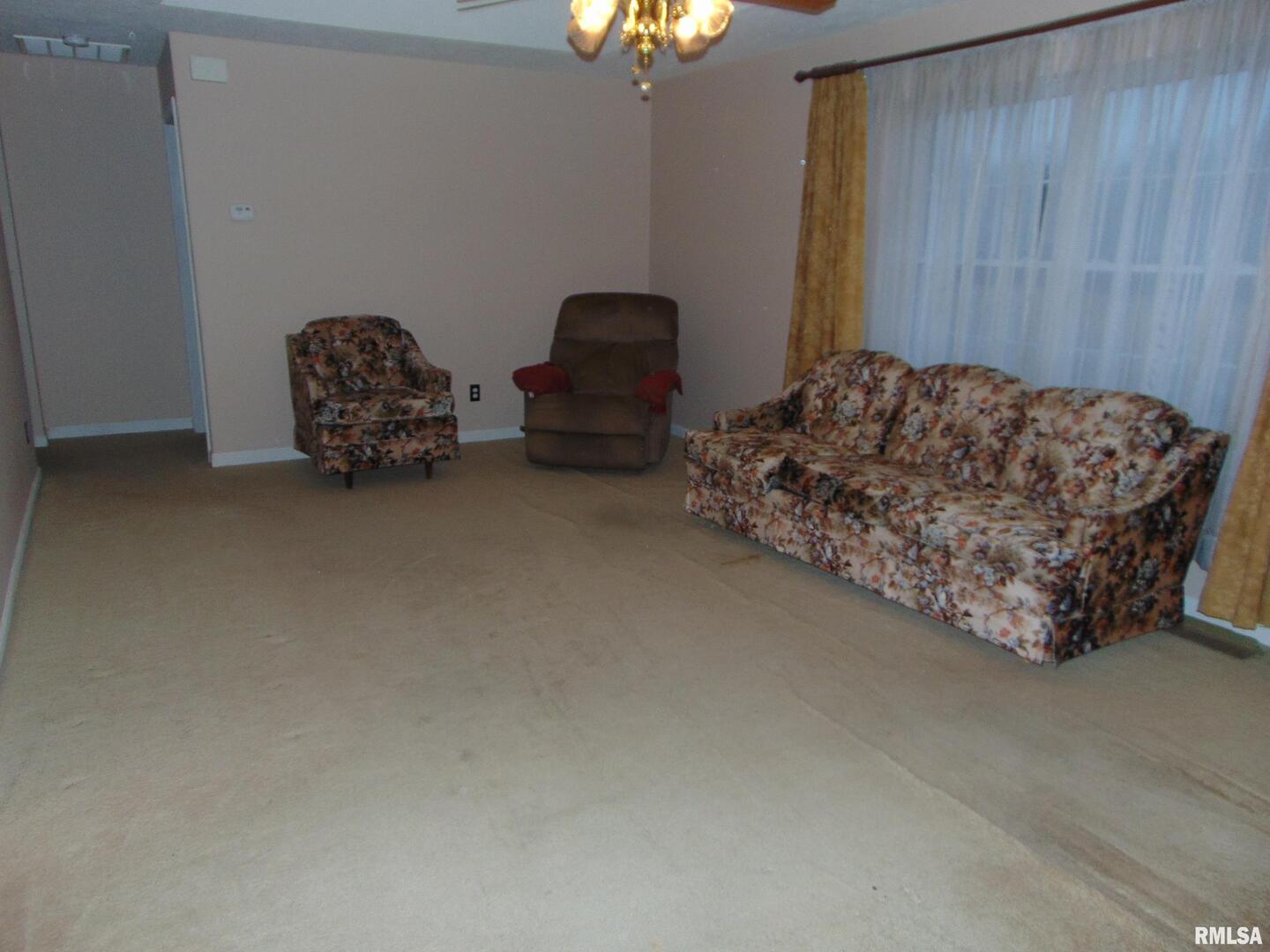 44 Bud Road Alto Pass, IL 62905 - Photo 15 of 21 a room with a bed and a chair