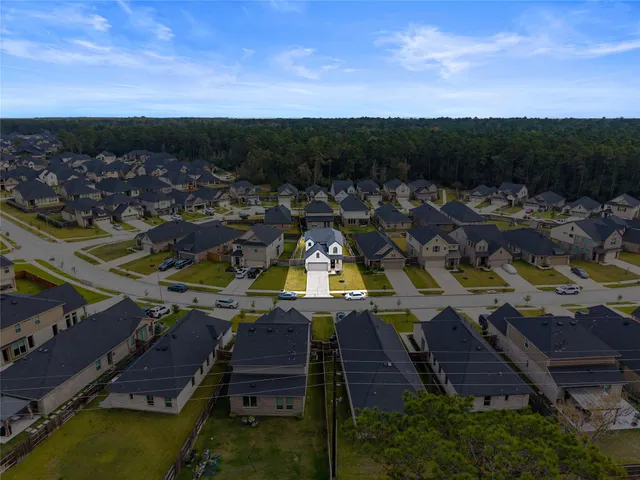 a view of a city with lawn chairs