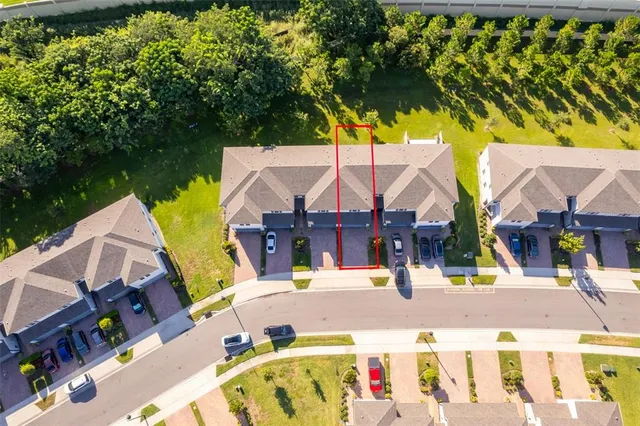 an outdoor space with swimming pool and furniture