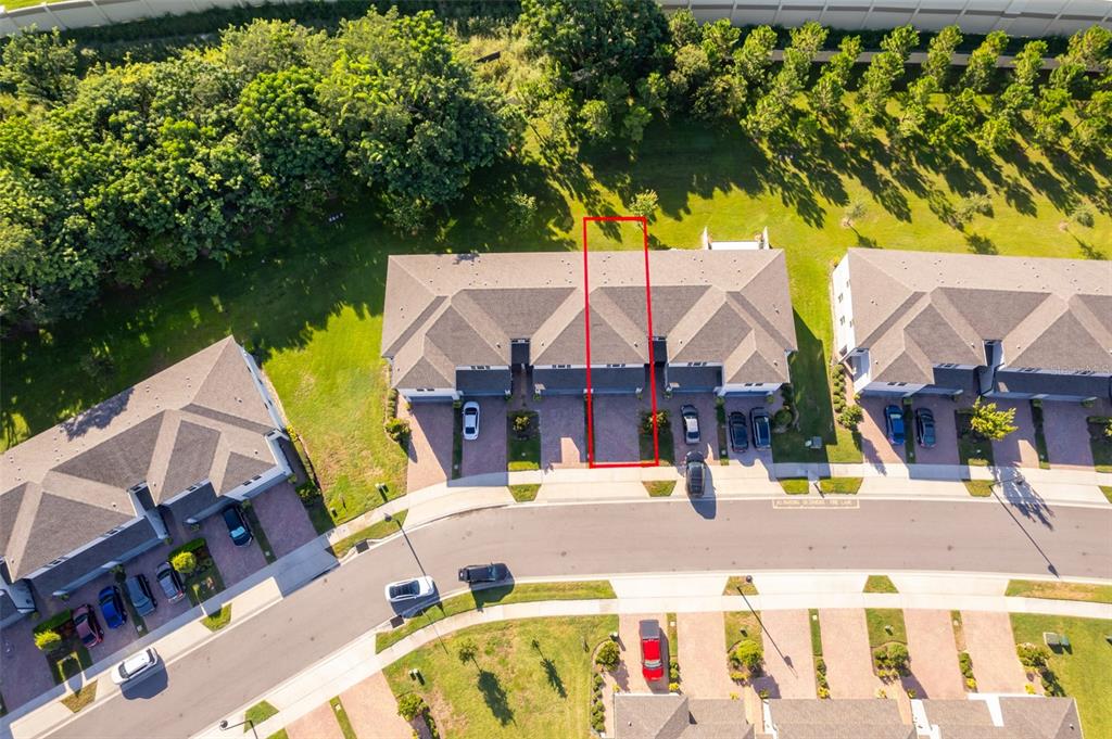 an outdoor space with swimming pool and furniture