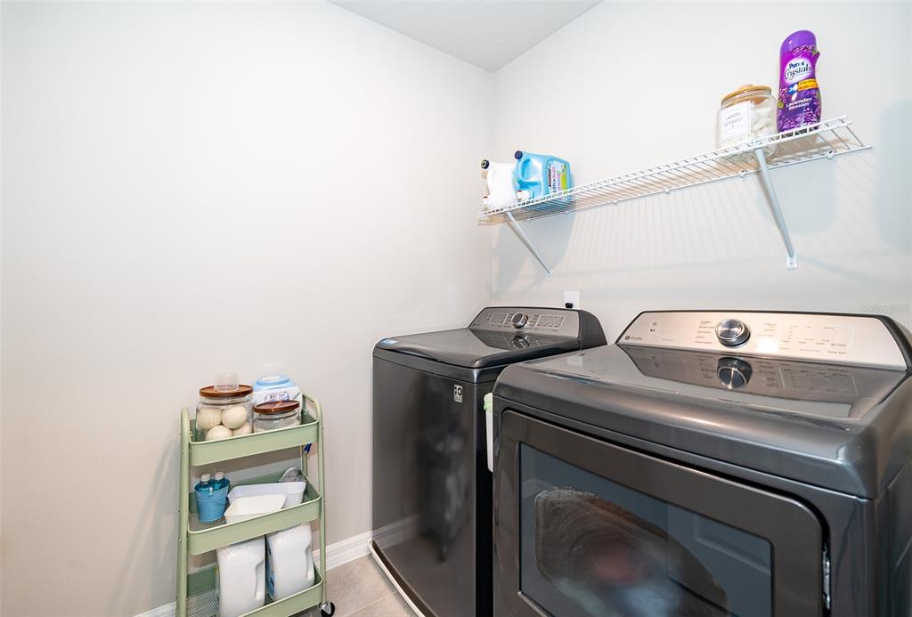 2555 Sweet Viburnum Way Ocoee, FL 34761 - Photo 22 of 26 a utility room with dryer and washer