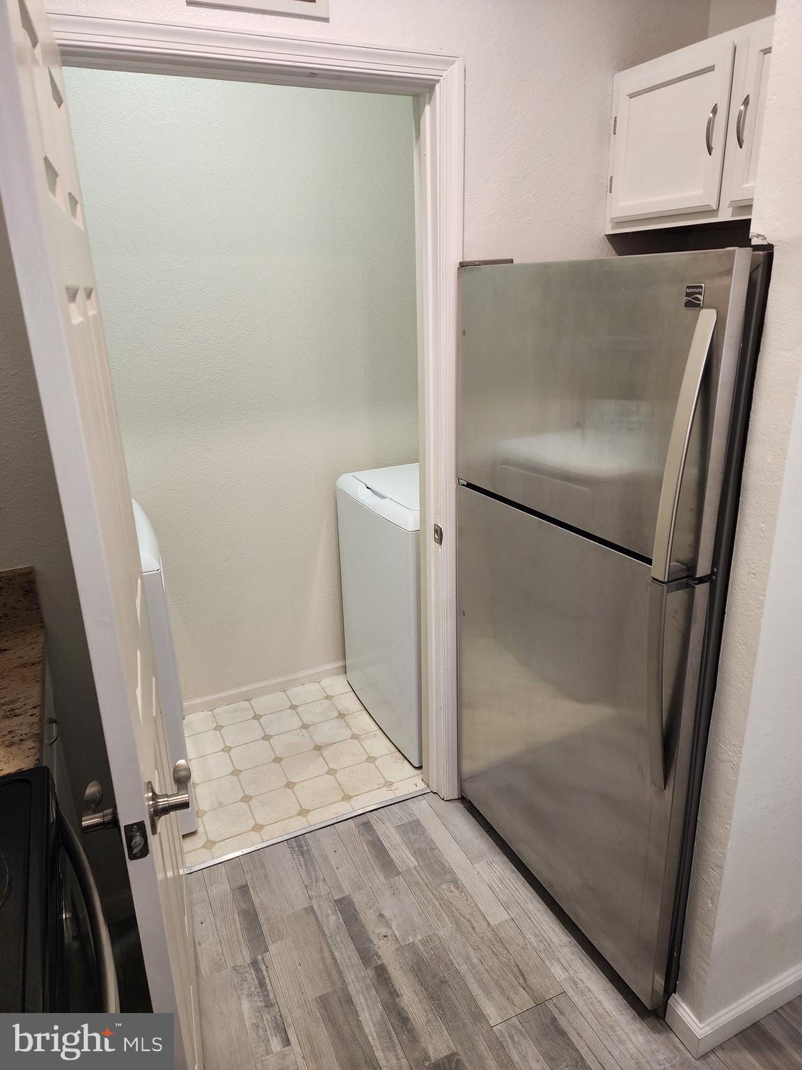 1521 Spring Gate Dr., Unit 10102 McLean, VA 22102 - Photo 15 of 46 Looking into onsite washer/dryer door entry