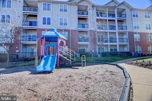 1521 Spring Gate Dr., Unit 10102 McLean, VA 22102 - Photo 33 of 46 a view of a park with a brick wall