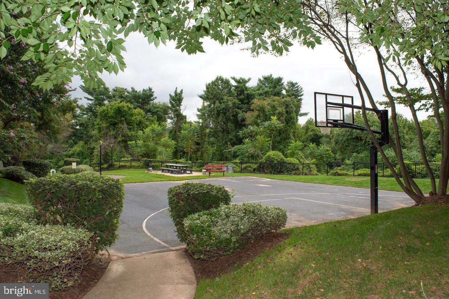1521 Spring Gate Dr., Unit 10102 McLean, VA 22102 - Photo 34 of 46 a view of a house with a yard