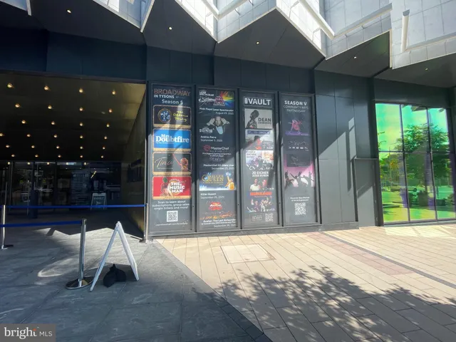 a view of a door and a street view