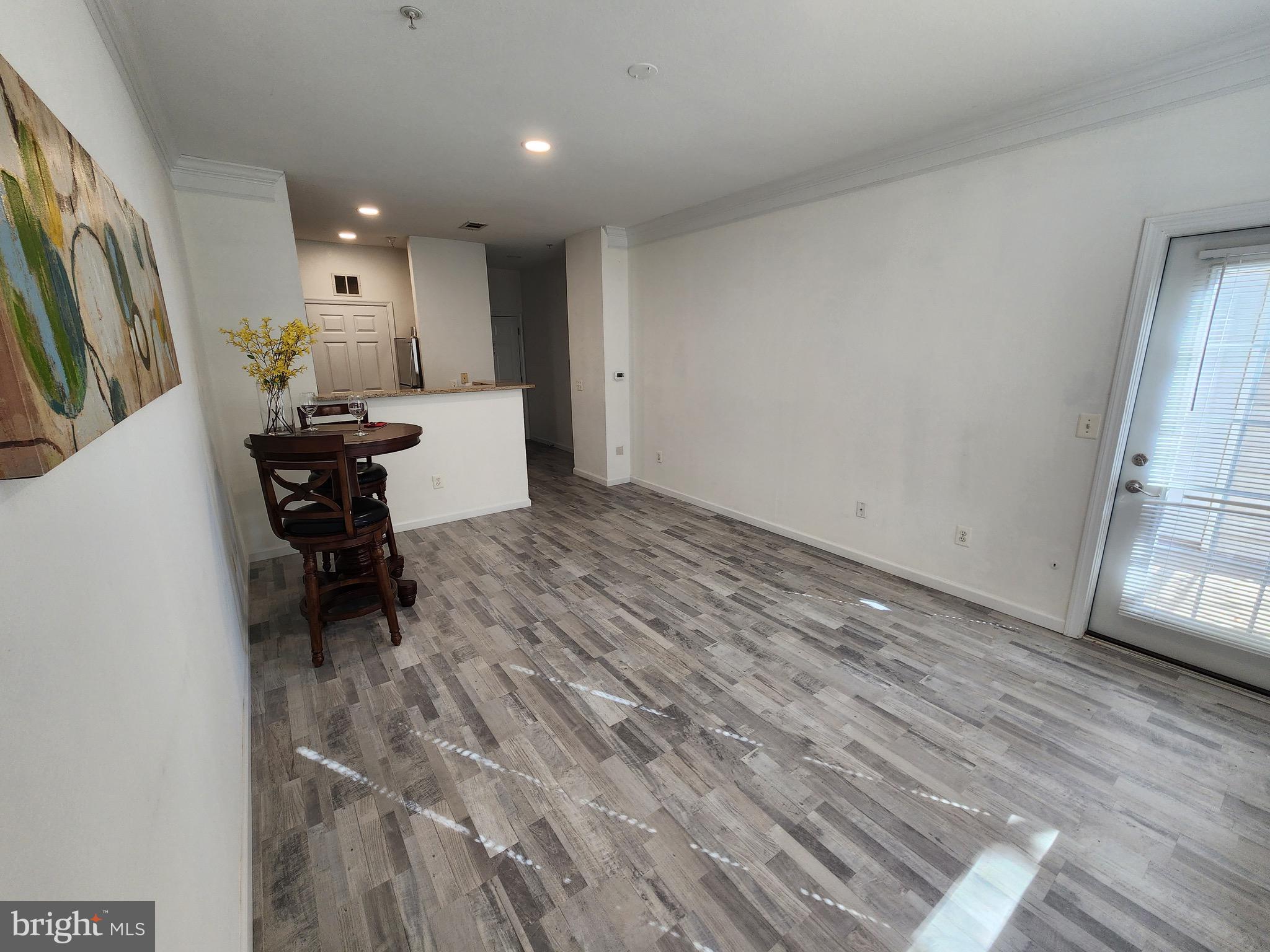 1521 Spring Gate Dr., Unit 10102 McLean, VA 22102 - Photo 5 of 46 Outdoor patio door to the right