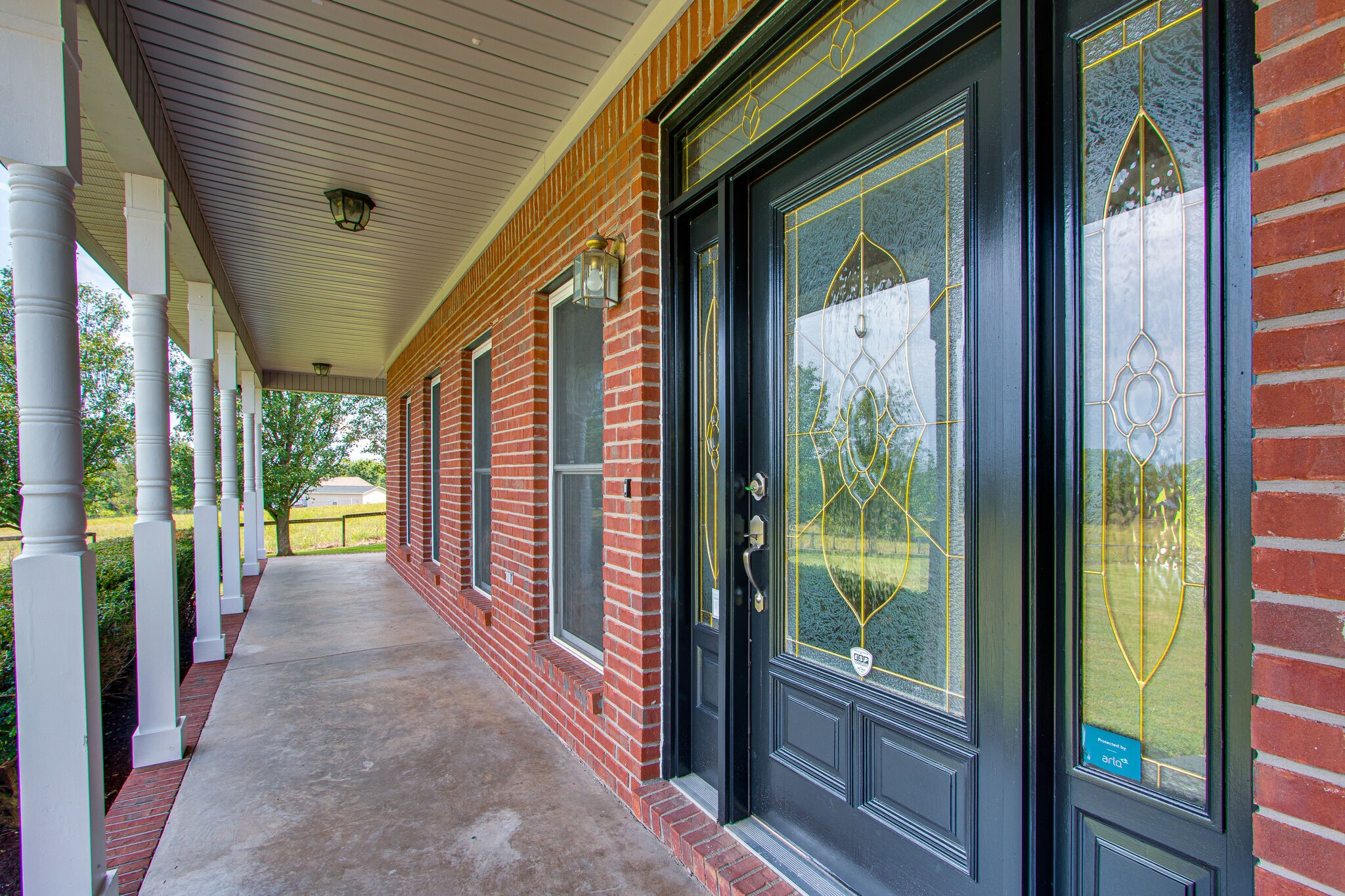 1950 Carpenter Bridge Road Columbia, TN 38401 - Photo 3 of 50 a view of a porch with wooden floor and stairs