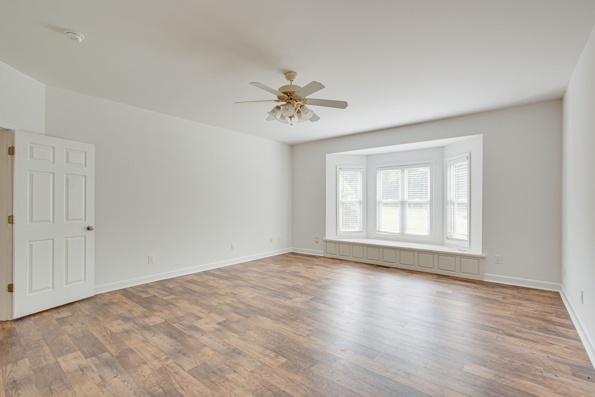 1950 Carpenter Bridge Road Columbia, TN 38401 - Photo 22 of 50 a view of empty room with wooden floor and fan