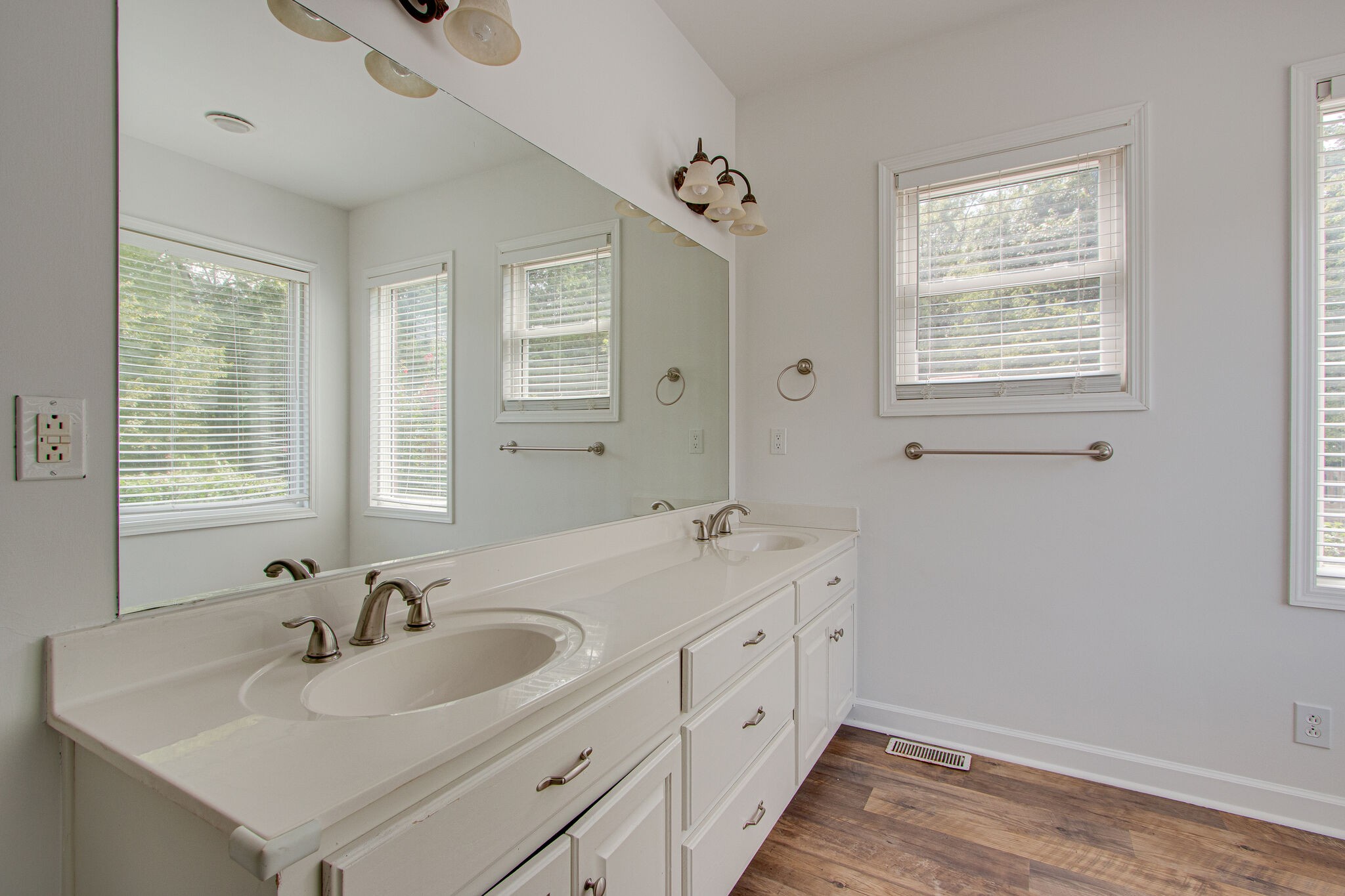 1950 Carpenter Bridge Road Columbia, TN 38401 - Photo 24 of 50 a bathroom with double vanity sink a mirror and a shower