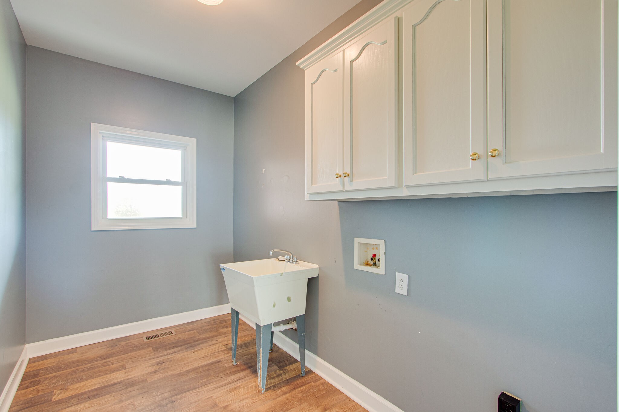 1950 Carpenter Bridge Road Columbia, TN 38401 - Photo 30 of 50 a bathroom with a sink a toilet and a window