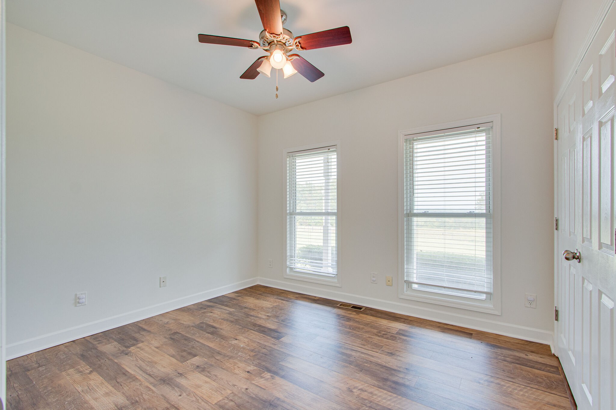 1950 Carpenter Bridge Road Columbia, TN 38401 - Photo 31 of 50 a view of empty room with wooden floor and fan