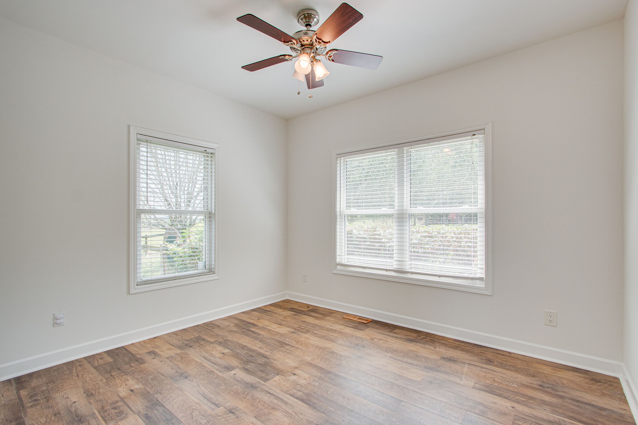 1950 Carpenter Bridge Road Columbia, TN 38401 - Photo 32 of 50 a view of an empty room with a window and a fan