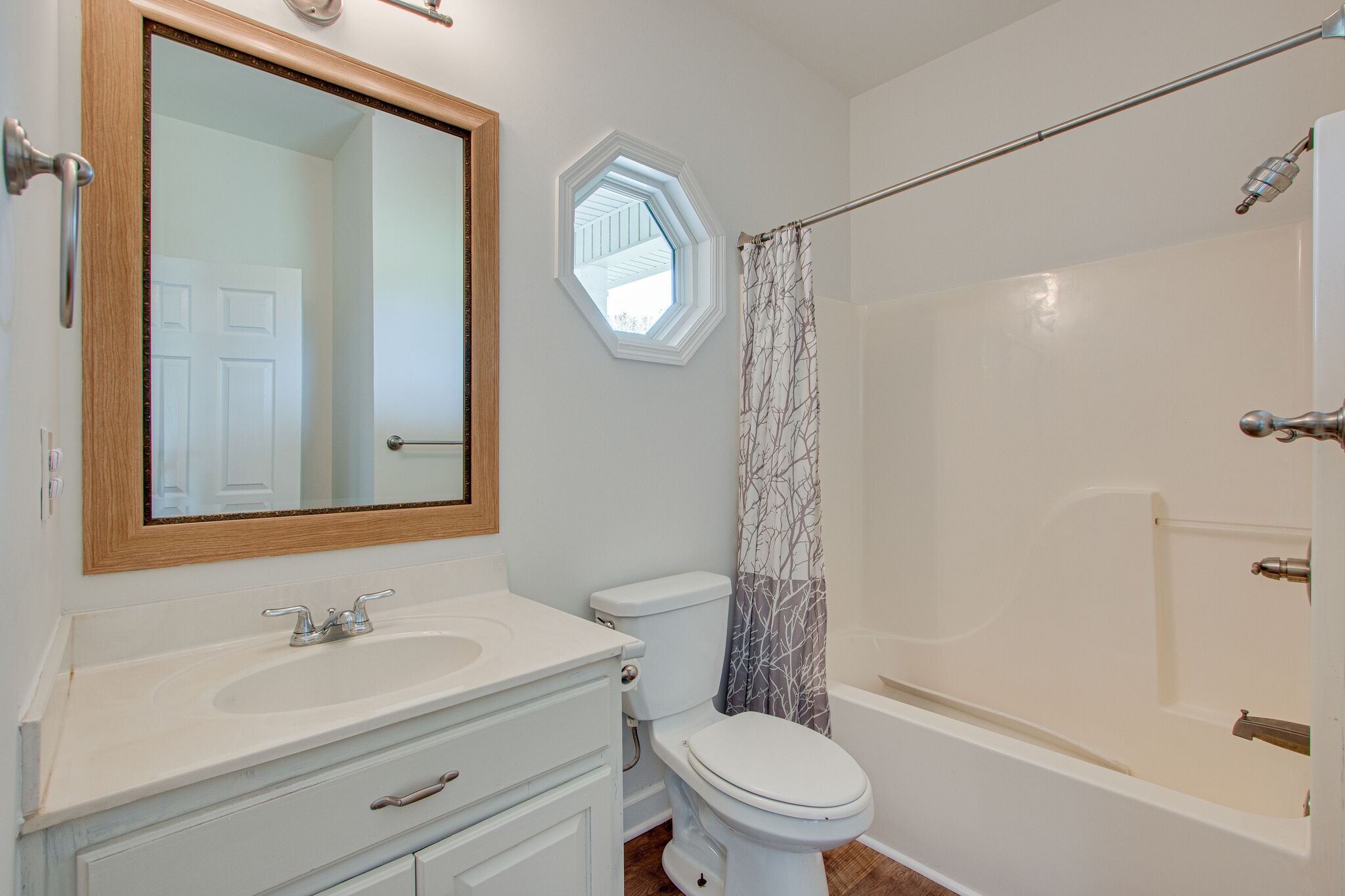 1950 Carpenter Bridge Road Columbia, TN 38401 - Photo 33 of 50 a bathroom with a sink a toilet and a mirror