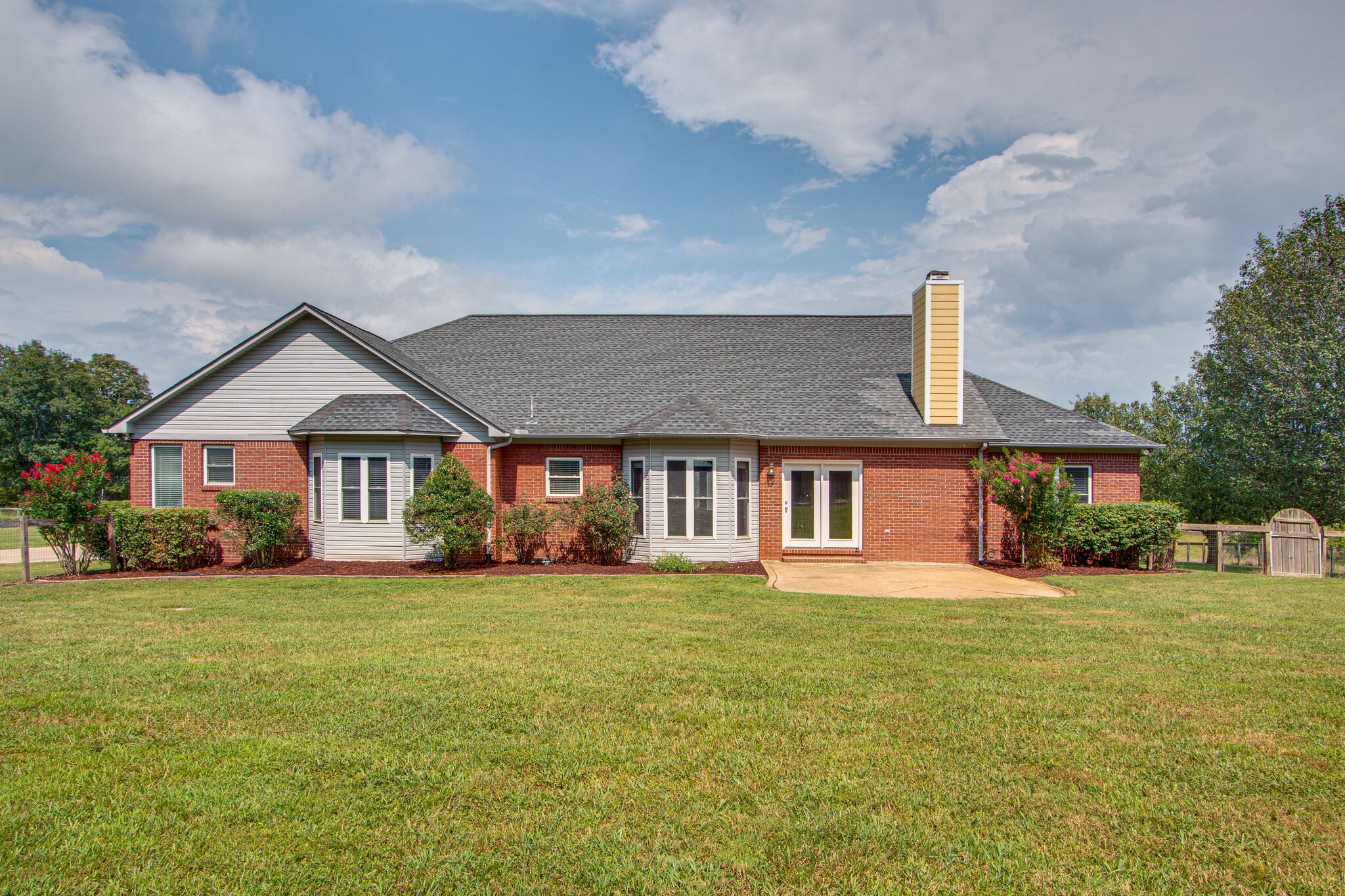 1950 Carpenter Bridge Road Columbia, TN 38401 - Photo 36 of 50 a front view of a house with a yard and garage