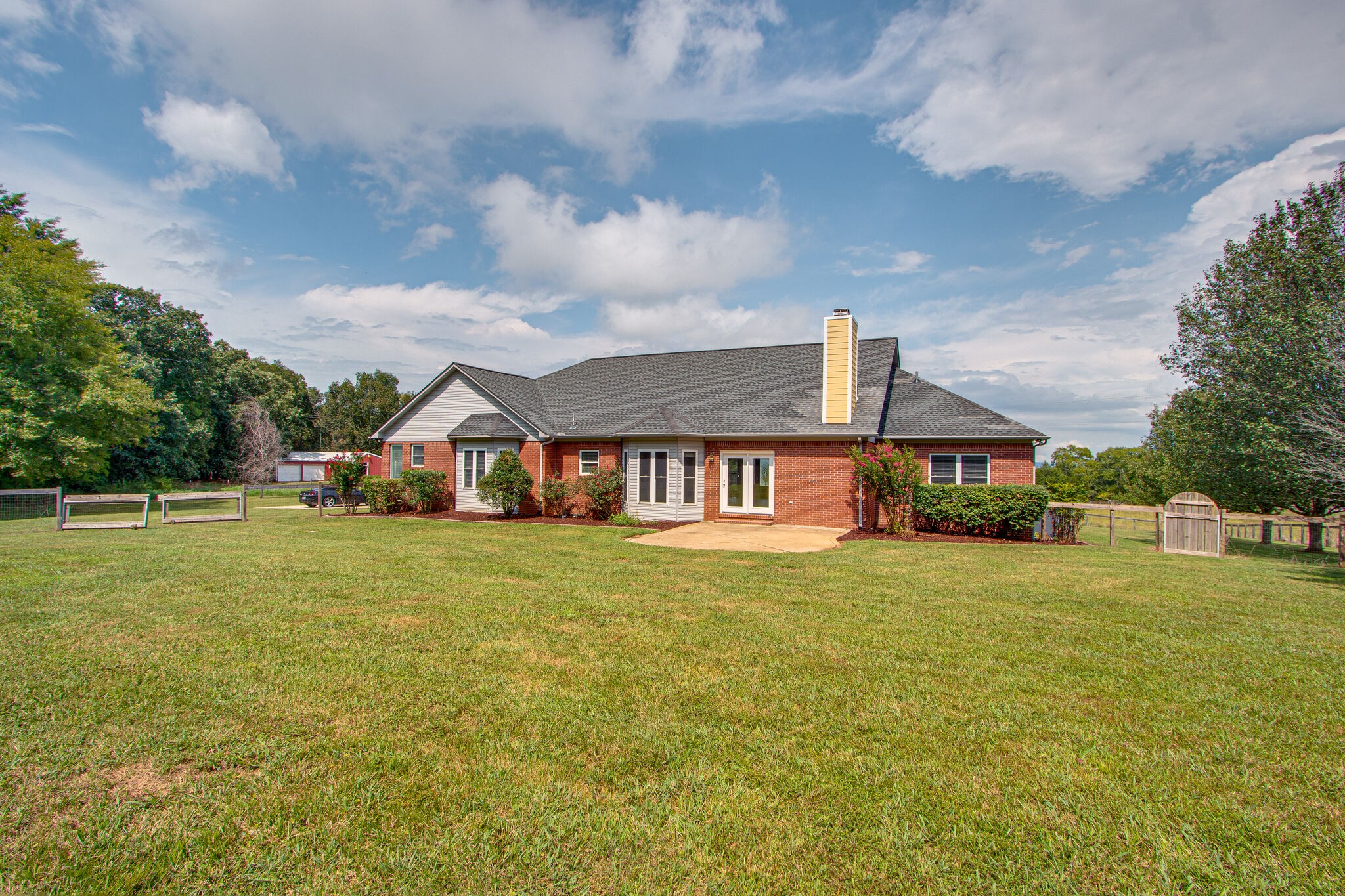 1950 Carpenter Bridge Road Columbia, TN 38401 - Photo 37 of 50 a front view of a house with a garden