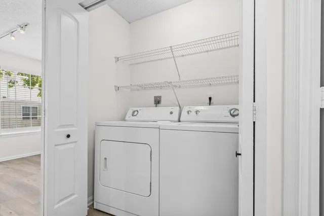 a utility room with dryer and washer