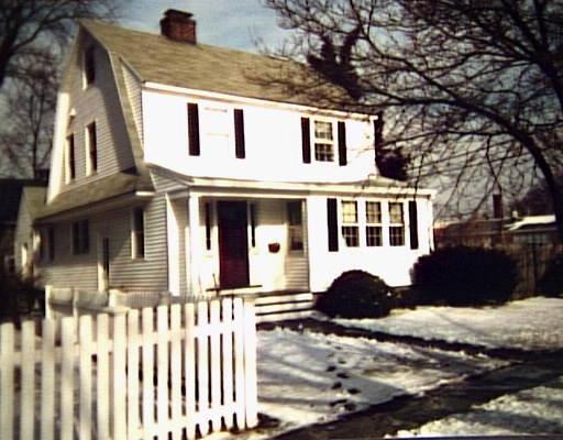 304 Meadowbrook Road Fairfield, CT 06824 - Photo 1 of 1 a front view of a house with a yard