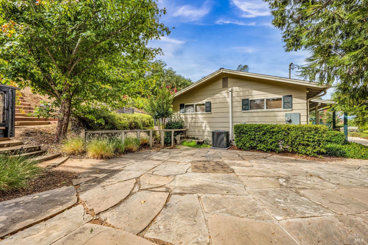 1389 Canyon Road Geyserville, CA 95441 - Photo 39 of 59 a view of a house with a backyard