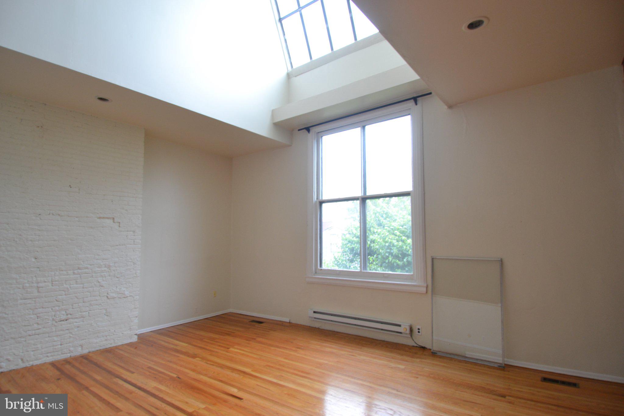 1010 Clinton Street, Unit 3M Philadelphia, PA 19107 - Photo 5 of 15 Bright, airy space with natural light.