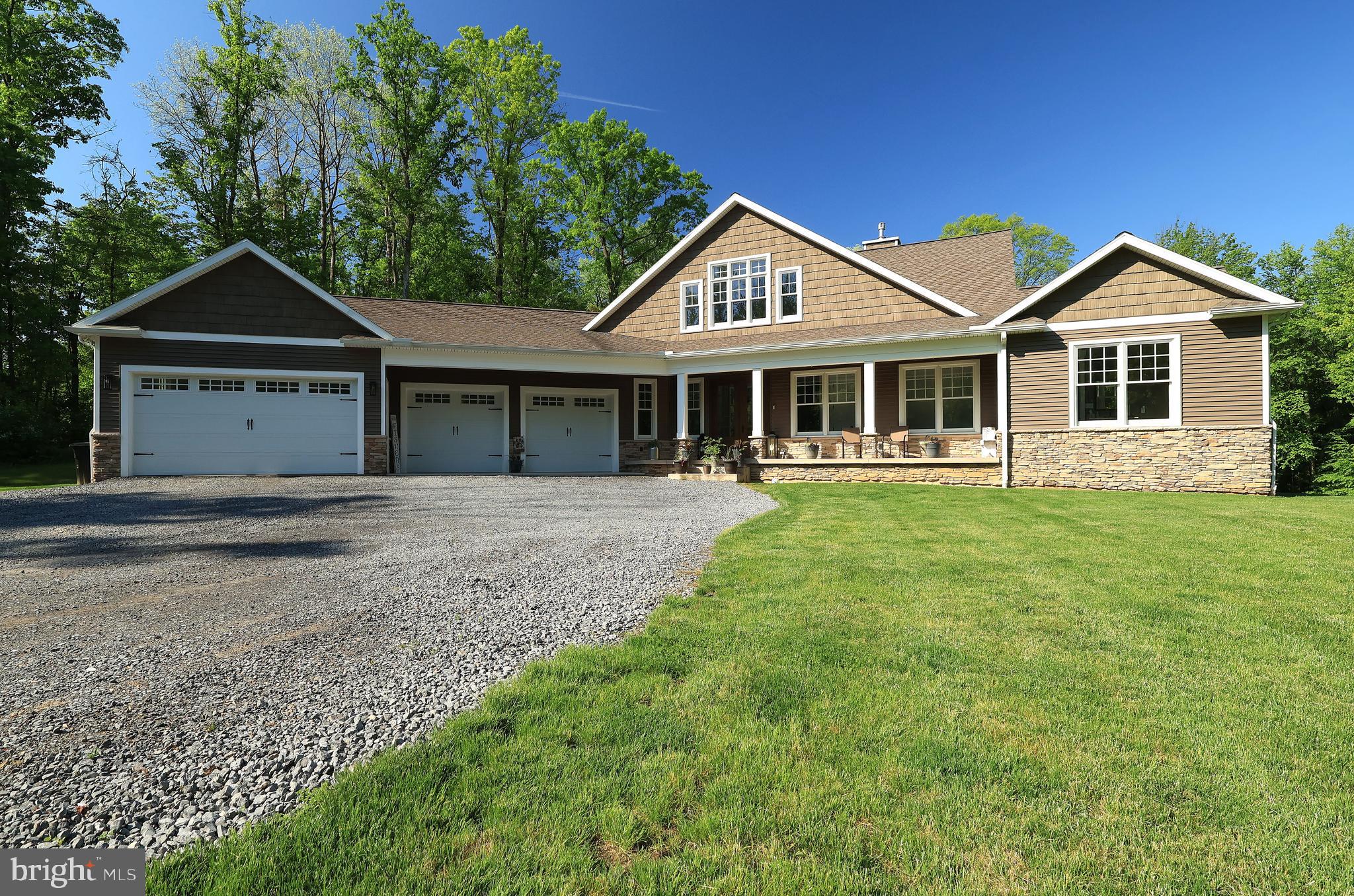 518 Two Mile Road Howard, PA 16841 - Photo 4 of 84 a front view of a house with a yard