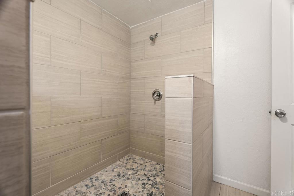 2758 Ribbonwood Road Boulevard, CA 91905 - Photo 12 of 38 a bathroom with a shower