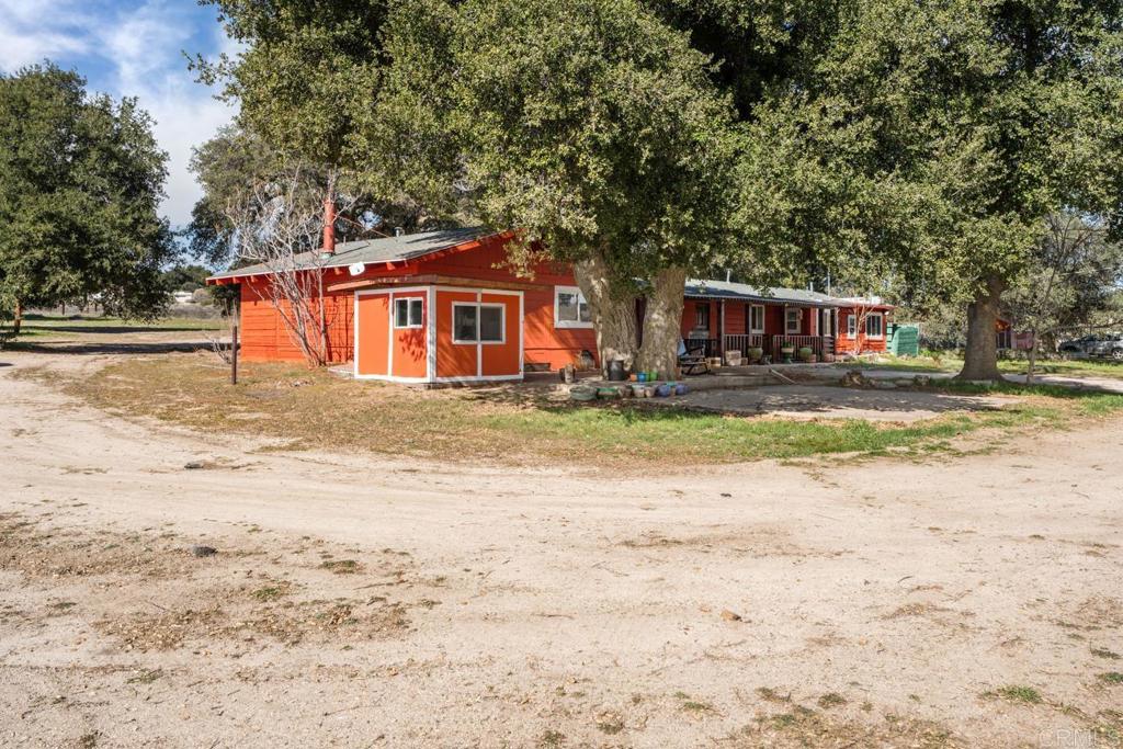2758 Ribbonwood Road Boulevard, CA 91905 - Photo 21 of 38 a front view of a house with a yard