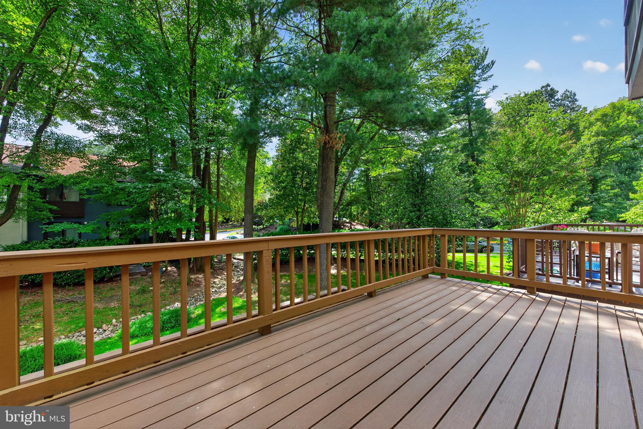 2031 Sarazen Place Reston, VA 20191 - Photo 23 of 27 Large Deck off Living Room & Dining - Wooded View