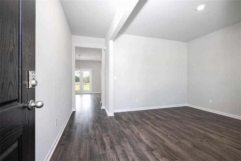 146 Aster Avenue Locust Grove, GA 30248 - Photo 15 of 28 wooden floor in a gallery