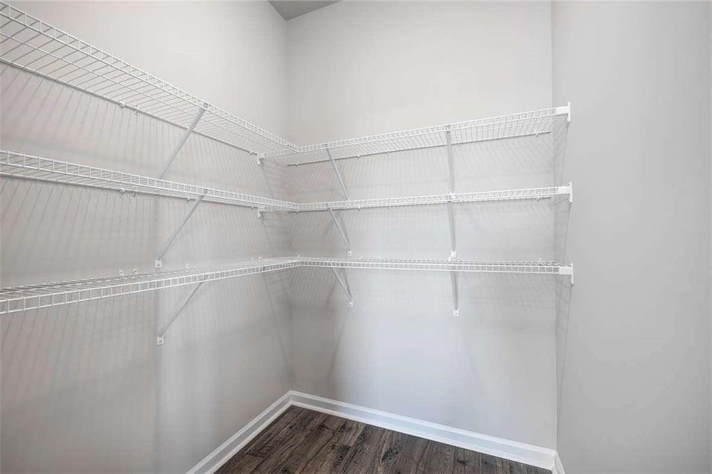 146 Aster Avenue Locust Grove, GA 30248 - Photo 18 of 28 a view of a room with racks on the wall