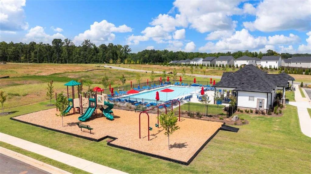 146 Aster Avenue Locust Grove, GA 30248 - Photo 28 of 28 an outdoor space with seating