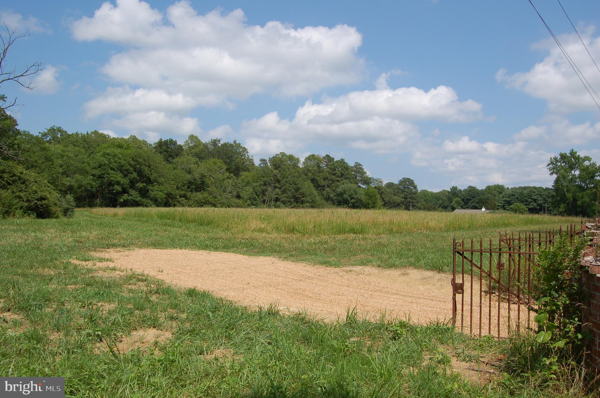 0 Tidewater Trail Rappahannock Academy, VA 22538 - Photo 12 of 64 a view of a lake from a yard