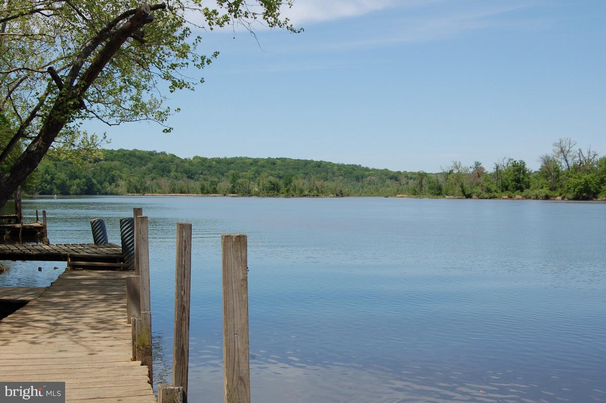 0 Tidewater Trail Rappahannock Academy, VA 22538 - Photo 55 of 64 a view of a lake with a mountain