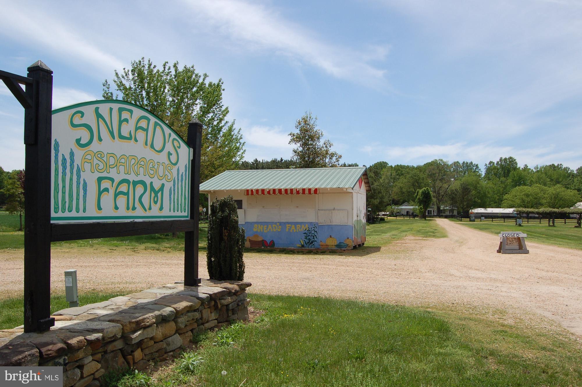 0 Tidewater Trail Rappahannock Academy, VA 22538 - Photo 58 of 64 a view of a street with benches in front of it
