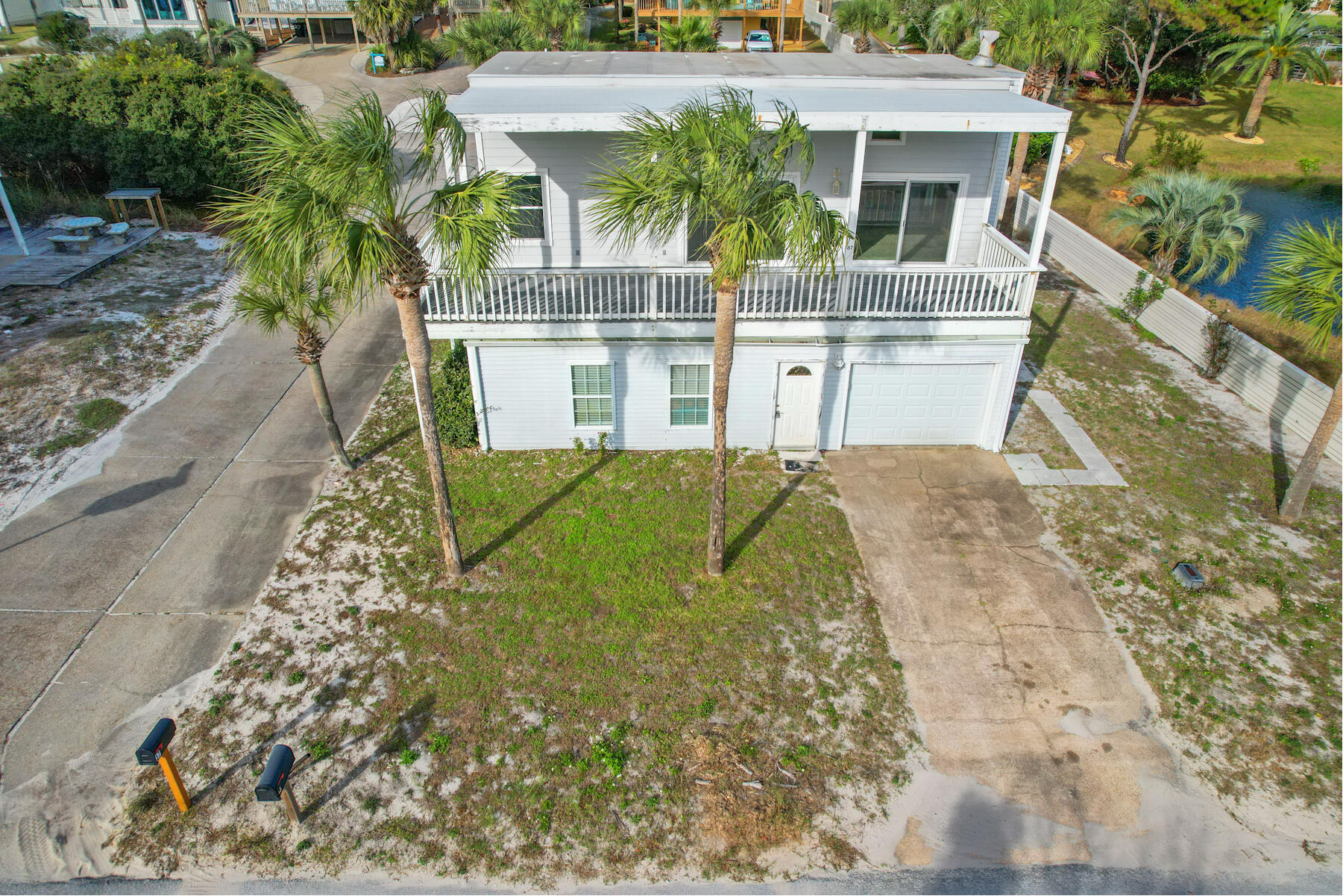 87 Walton Magnolia Lane Inlet Beach, FL 32461 - Photo 12 of 17 a view of a house with a small yard