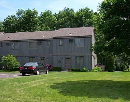 60 Stony Hill Road, Unit 60 Brookfield, CT 06804 - Photo 1 of 1 a front view of a house with garden