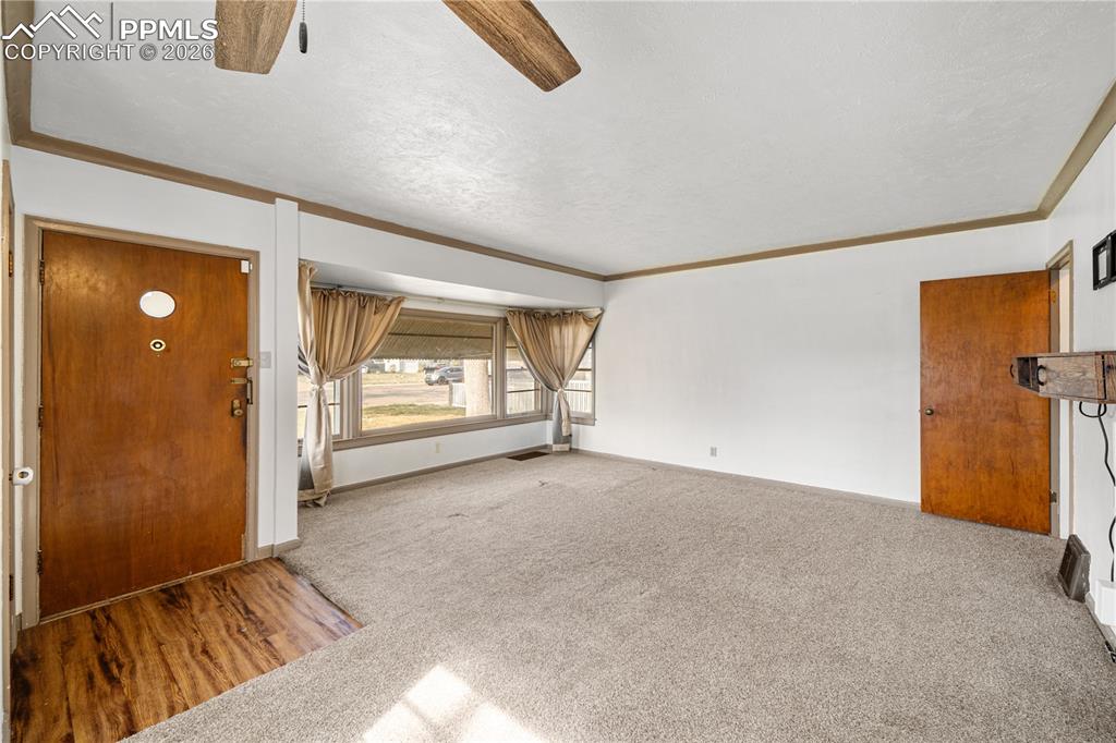 805 West Routt Avenue Pueblo, CO 81004 - Photo 3 of 27 a view of an empty room and a window