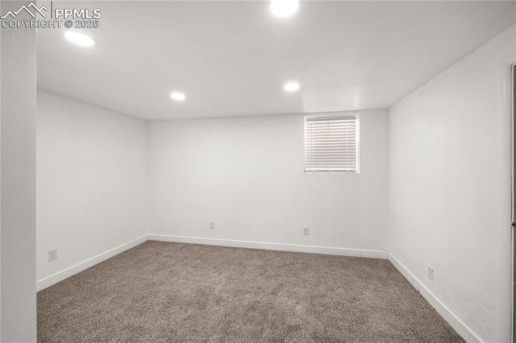 805 West Routt Avenue Pueblo, CO 81004 - Photo 7 of 27 an empty room with a window