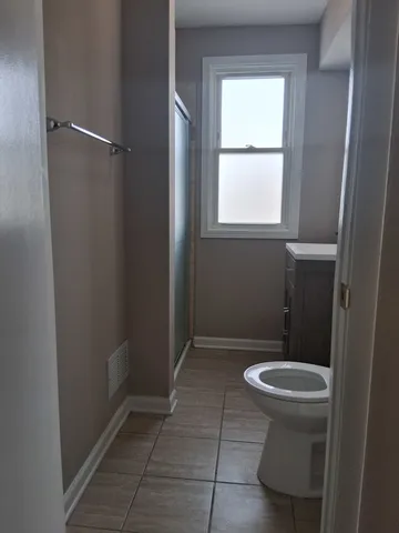 a bathroom with a toilet