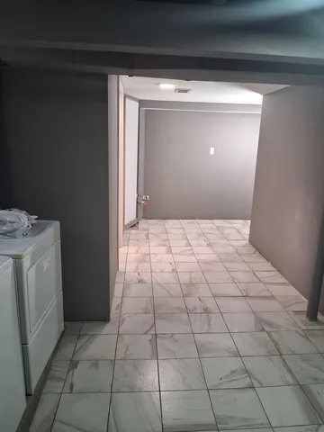 a view of a utility room with empty racks