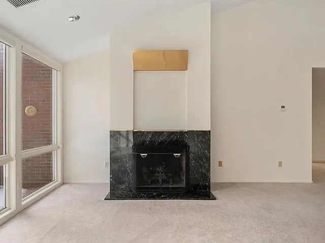 a room with a fireplace