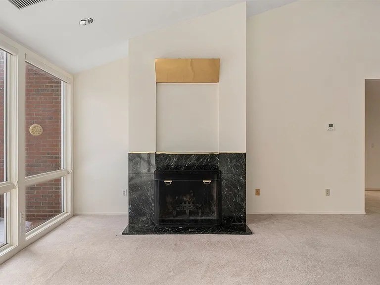 241 Perkins Street, Unit D605 Boston, MA 02130 - Photo 5 of 10 a room with a fireplace