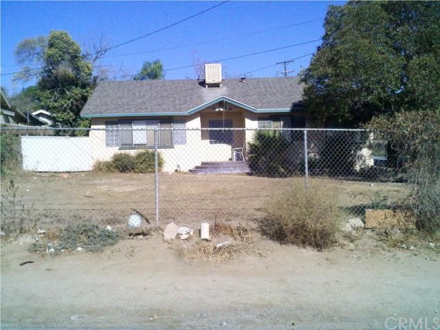 5791 36th Street Riverside, CA 92509 - Photo 1 of 1 a front view of a house with a yard