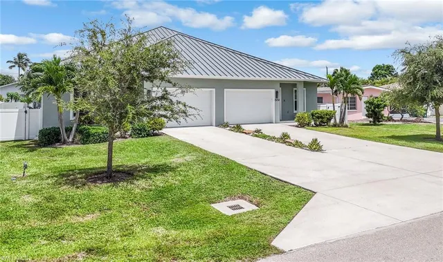 a house with garden in front of it