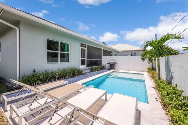 a house with garden in front of it